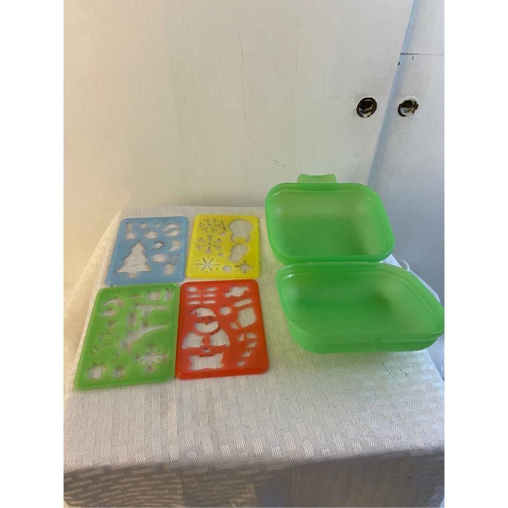 Tupperware 4 travel stencils with green container‎ measures 5x4”